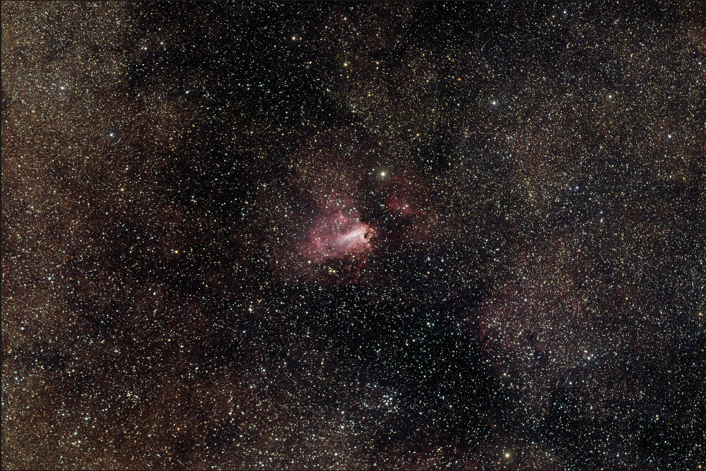 This Nebula goes by many names; The Omega Nebula, also known as the Swan Nebula, Checkmark Nebula, Lobster Nebula, and the Horseshoe Nebula.  This picture of NGC 6618 was taken 5/23/2014 with a Takahashi FSQ ED located at the Siding Spring Observatory - Australia.