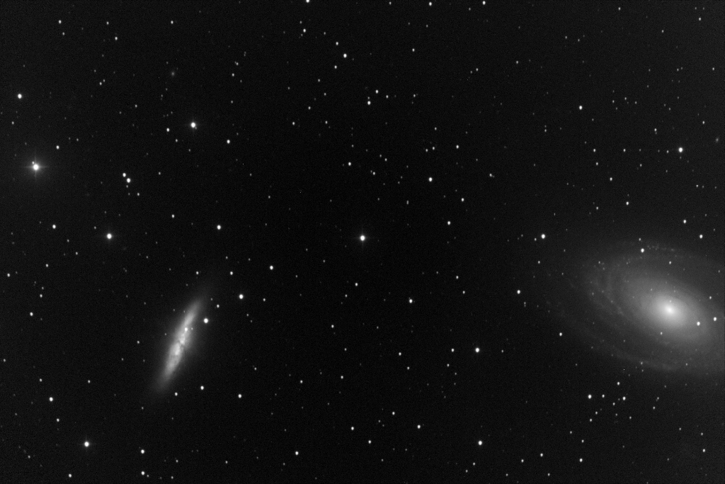 Messier 82 (left), known as the Cigar Galaxy, is a prototype nearby starburst galaxy.  Visible here - M82 experienced an apparent Type Ia supernova (SN 2014J), which was observed in the galaxy on 21 January 2014.  M81 (right) or Bode's Galaxy is a spiral galaxy.  This shot was taken on 2014-01-28, one week after the supernova, with T11, a Planewave 20" CDK located at the New Mexico Skies Observatories in Mayhill, New Mexico.